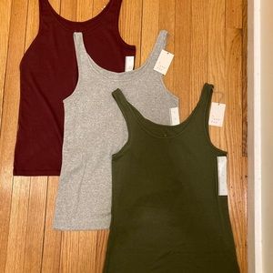NWT- set of three ultra soft tanks. Size L.